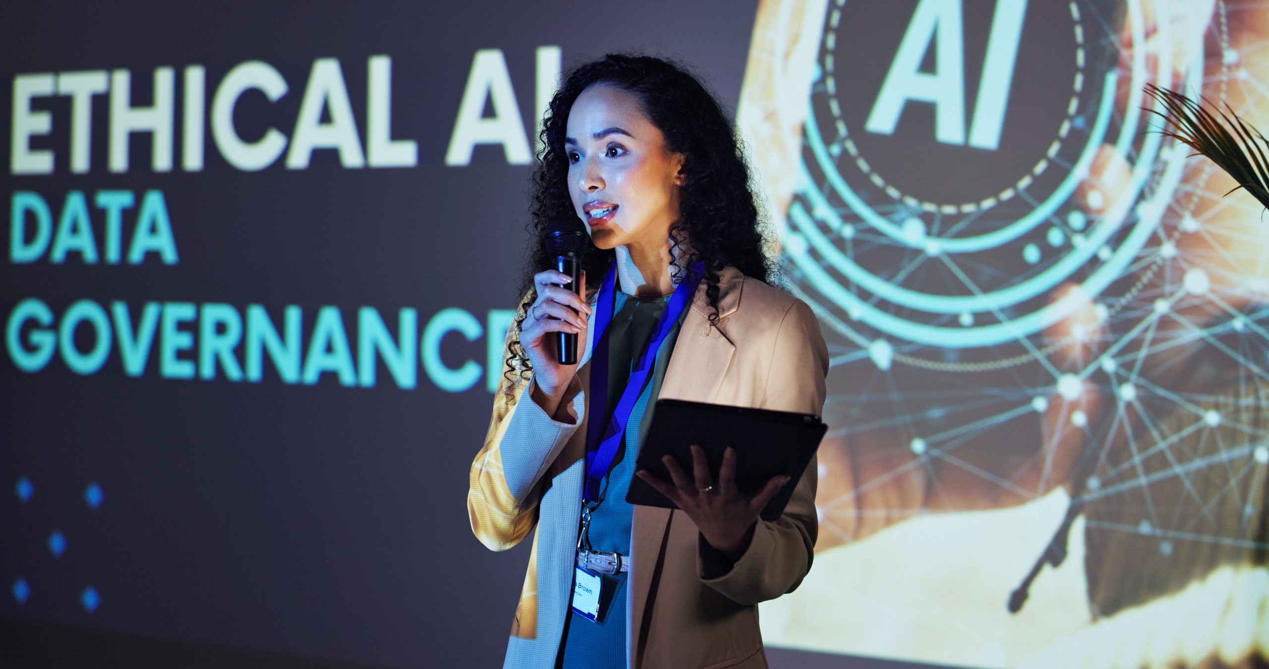 women giving a presentation on AI ethics